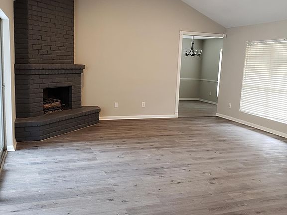 This home has been remodeled throughout the house. New Vinyl floors, fresh paint, recessed lights, great sliding glass door to extended back patio and two large picture windows to the front. Very Bright!