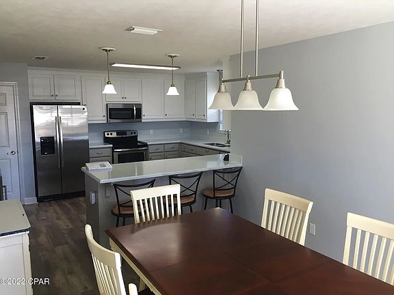 Dining room and adjoining kitchen
