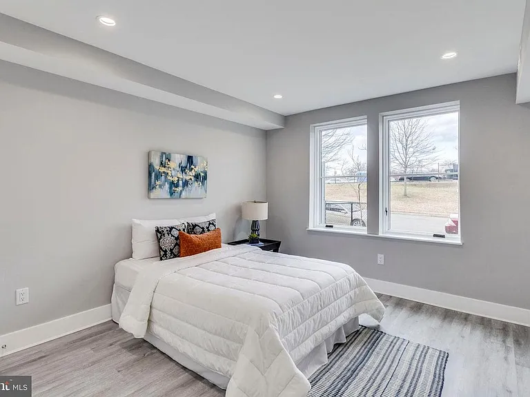 Bedroom with large window and ample space