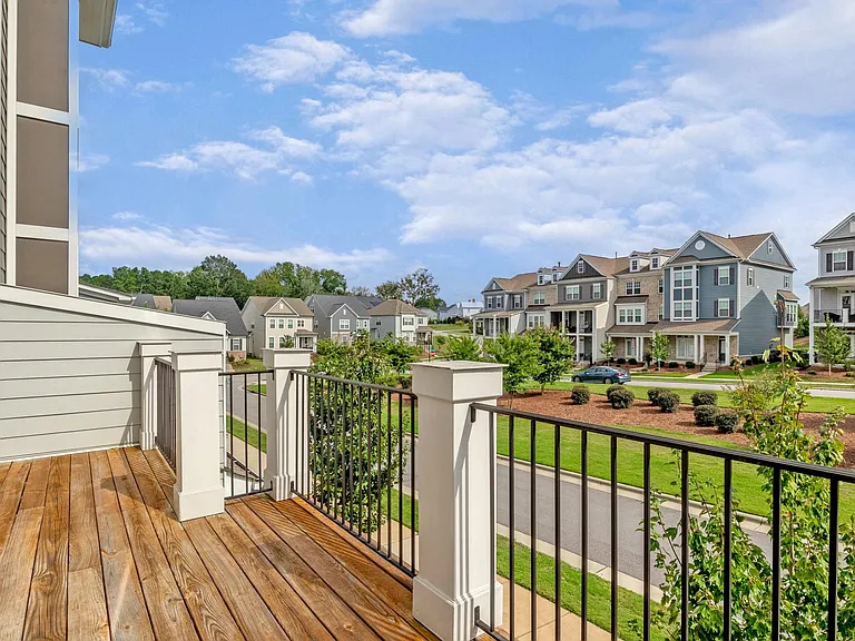 Front balcony overlooking lawned cul-de-sac