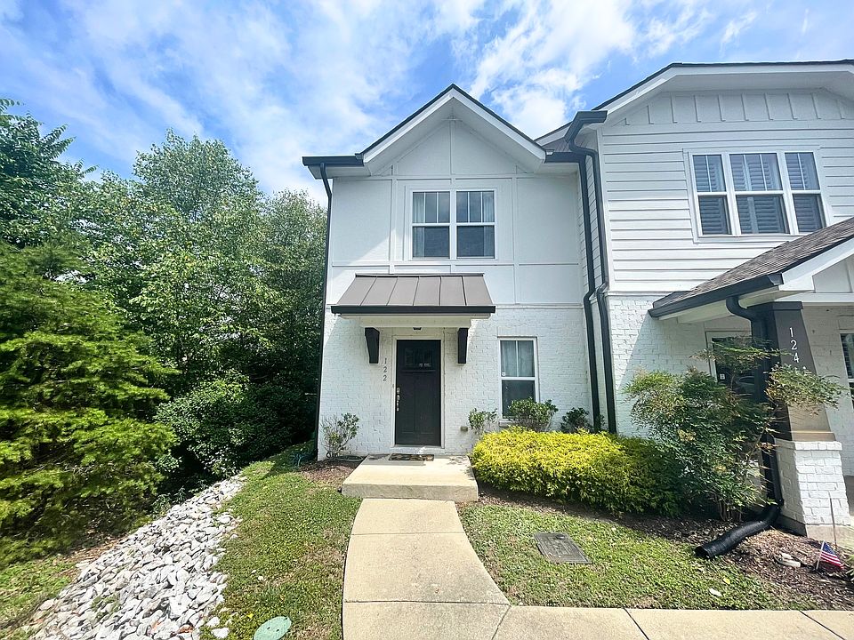 Secluded, corner unit with parking lot