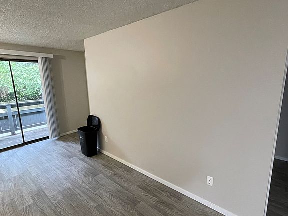 Right side of living room, to the right is the short hallway with washer/dryer and my room and my bathroom. Behind is the kitchen. The fireplace in the pic before is real and uses wood. 255 Character limit :/