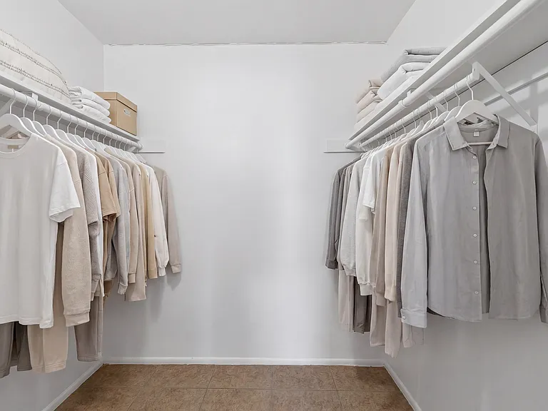 Huge walk-in closet with exceptional storage space.