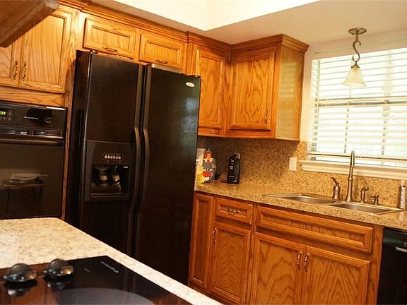 Updated kitchen with new cabinets, counters & appliances