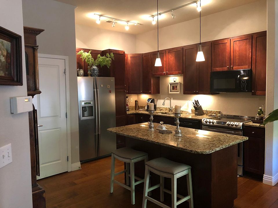 Cook's kitchen with stainless fridge and new stainless appli