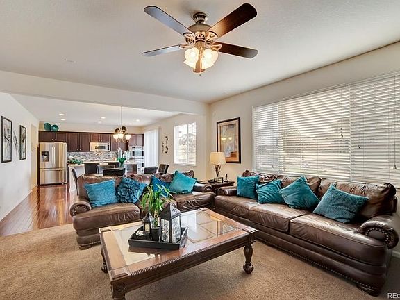 The Open Family Room, Dining Area, and Kitchen offers easy living