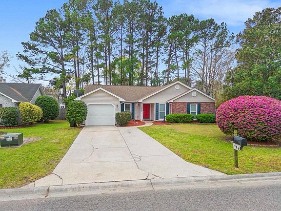 Single car garage plus parking for several vehicles in the driveway