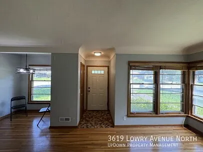 "Charming 3-Bedroom Home with Gleaming Hardwood Floors and 2 Full Baths in Robbinsdale!" — Photo 3