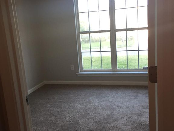 First floor bedroom on front of house
