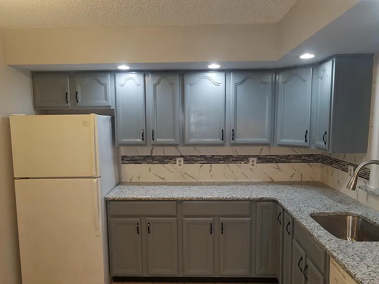 Kitchen ( Backsplash & Granite Countertop), Recessed Light, Plenty of storage in kitchen cabinets, ceramic tiles