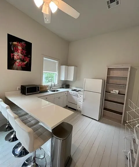 7529 Freret St — Photo 12