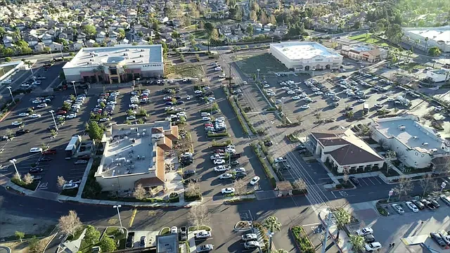 Mission Grove Shopping Center with Sprouts Market, Stater Bros., luxury cinema and multiple retail stores and restaurants.