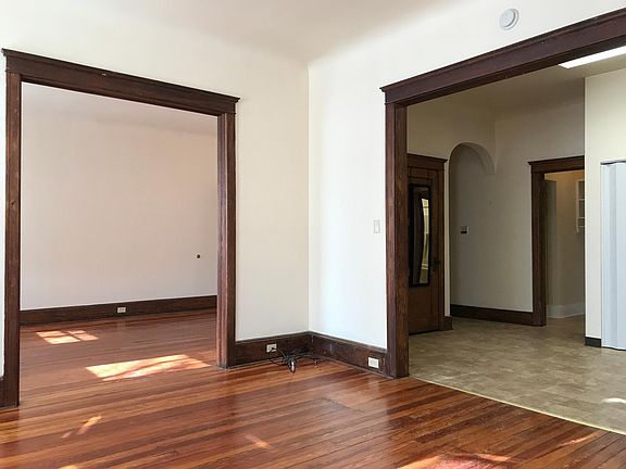 Living Room into Bedroom and into Kitchen.