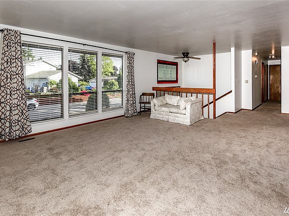 Another view of the living room looking toward the front entry stairs.