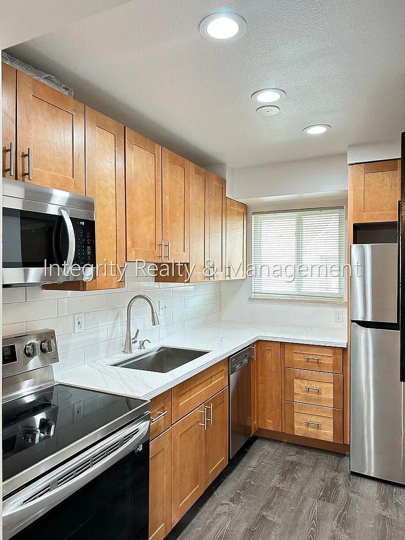 2 Bed/2.5 Bath, 1,298 Sqft - 231 E Iliff Ave Denver, CO 80210 — Photo 1