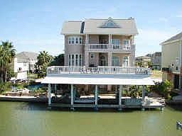 Expansive decks w/ oversized boat house