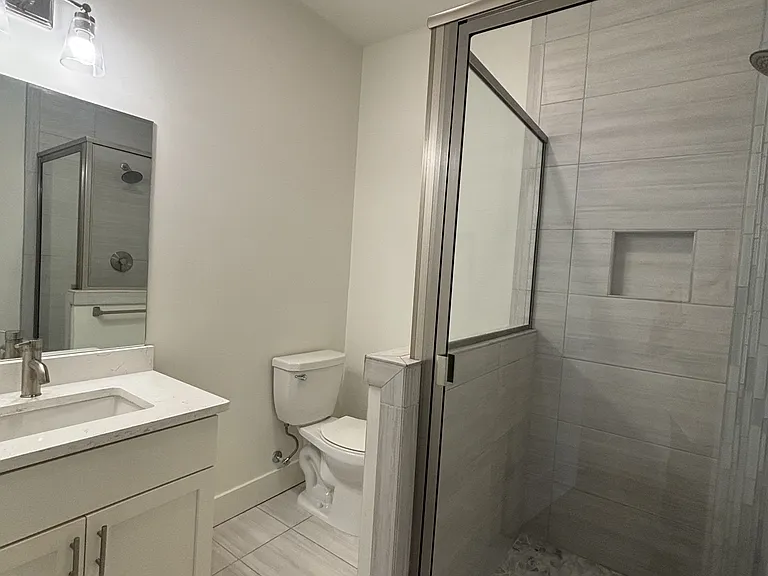 Both bedrooms have this en-suite bathroom