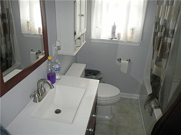 Updated bath with fiberglass tub shower