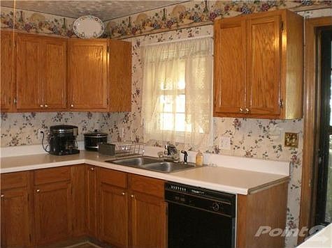 10x11 Kitchen that opens to Family room.