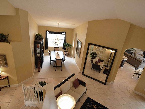 The view from the stairway landing is very dramatic. Note how the home embraces the modern open concept with a flowing floor plan.
