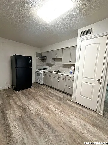153 E Baylor — Photo 1