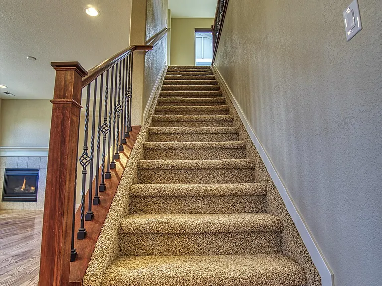 Stairway going up to upper level.
