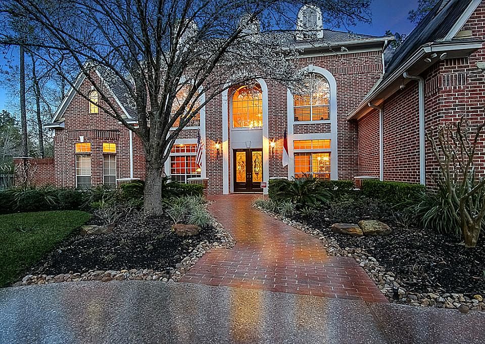 Welcome to 144 Red Sable Drive in Grogan's Point, The Woodlands, Texas.