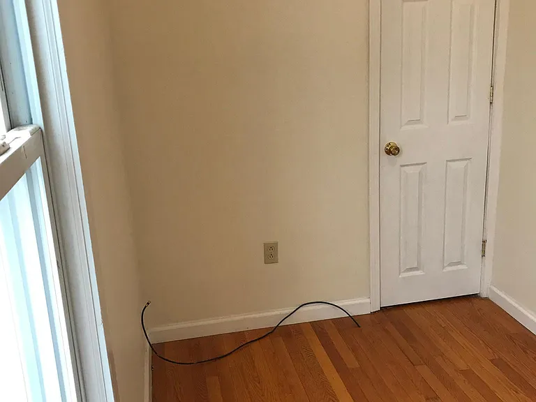 SMALL BEDROOM OFF LIVING ROOM