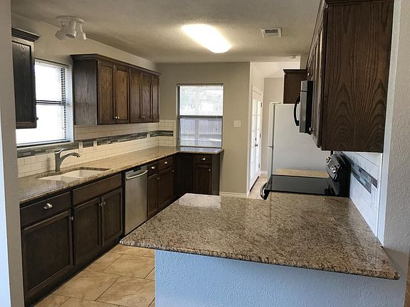 Kitchen with bar top