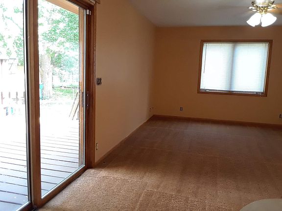 Second family room with the entrance to the deck
