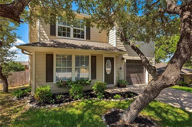 Oak tree in the front of the home provides shade all day.