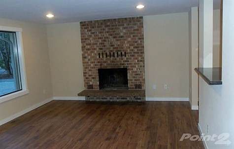 Gleaming Wood Floors Sprawl Thru-out