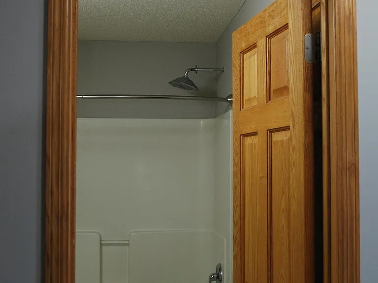 Full bathroom with rainfall shower head