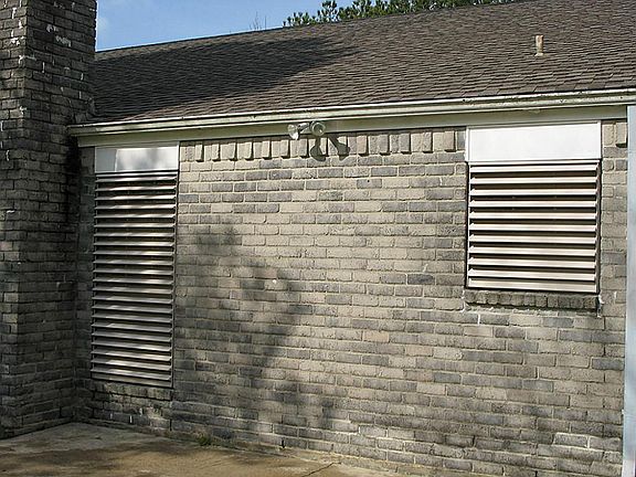 All windows feature Louvered Shutters
