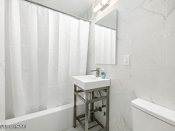 3rd image of 227 E 12th St APT 2B