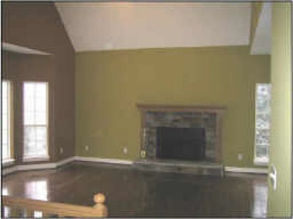 Living Room w/ Hard Wood Floors