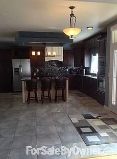 Large Kitchen with Cherry Cabinets