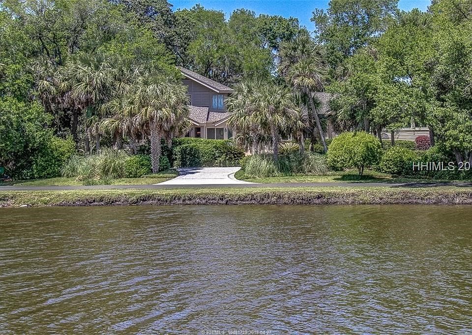 Front of home from across the lagoon on S. Live Oak
