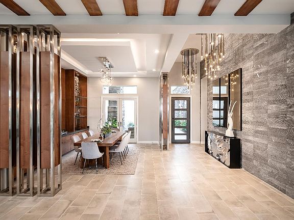 Welcoming foyer leads to the dining room and beyond