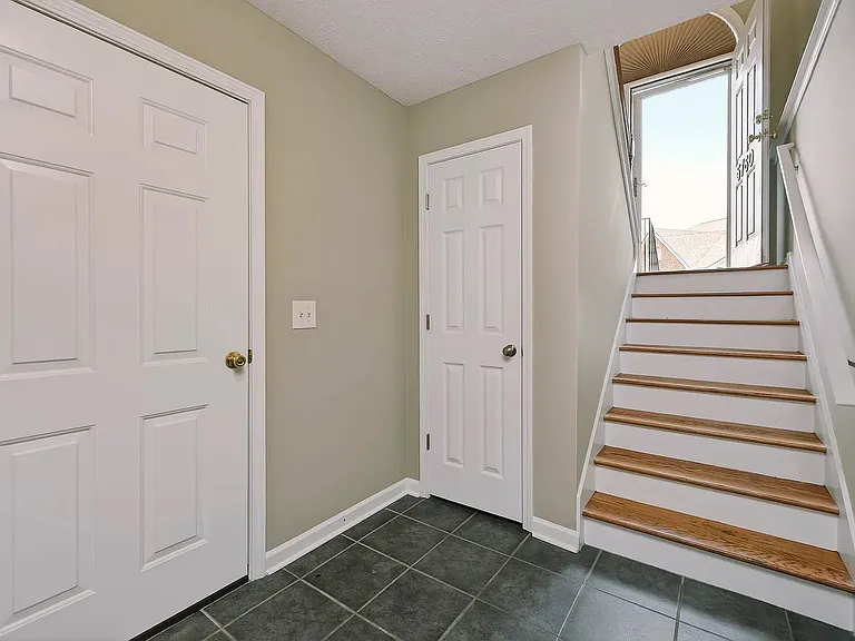 Downstairs near garage and bonus room