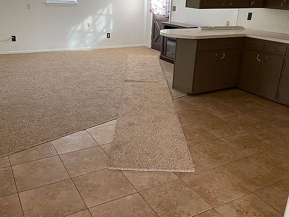 Large den by kitchen