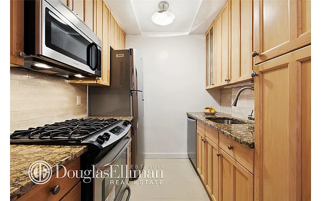 Sold by Douglas Elliman | media 13