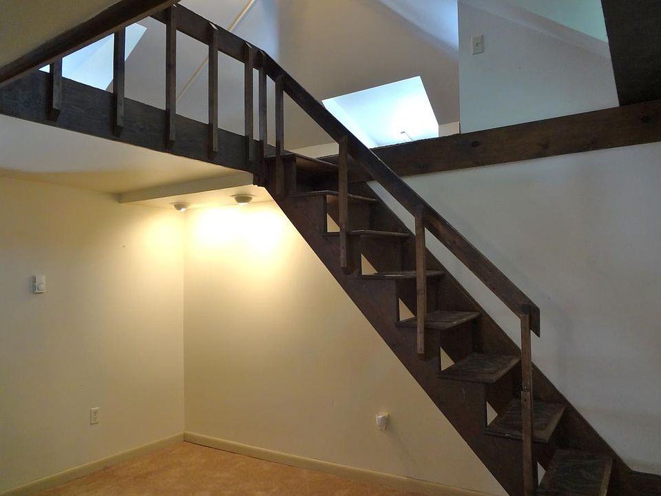 Steps from living room to loft