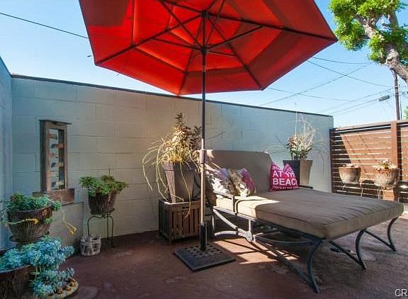 The living room opens out to this secluded entry courtyard; quie