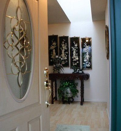 Get ready to step in to tranquility! The foyer welcomes you with a large skylight to keep the home b