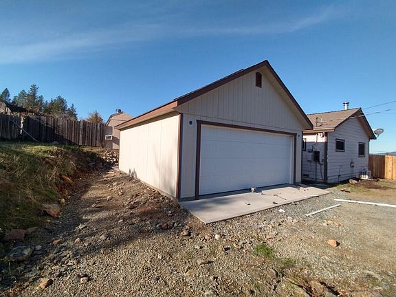 Side of garage and house