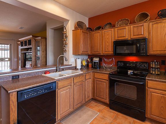 3rd image of 16973 W Desert Rose Ln