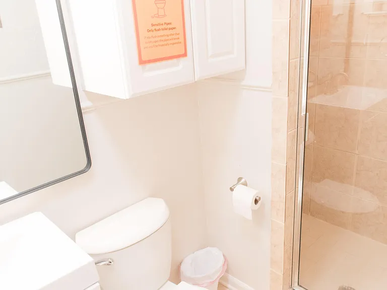 Bedroom 1's private bathroom with shower.