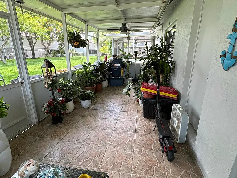 702 NW 208th Ter — Photo 12