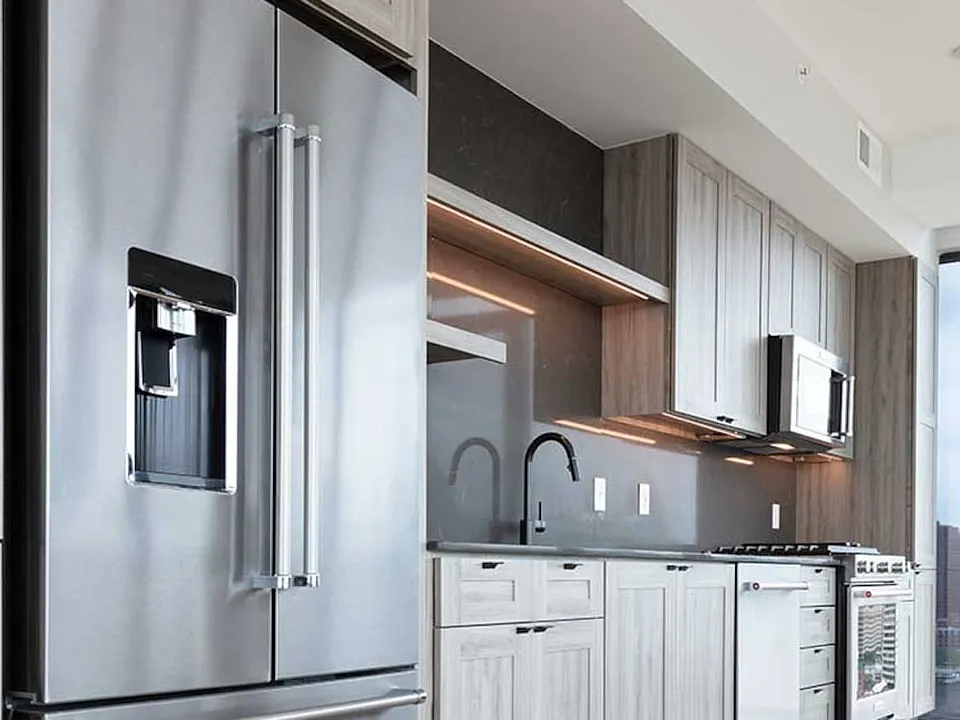 Penthouse-level Signature Collection apartment homes feature kitchens with upgraded appliances